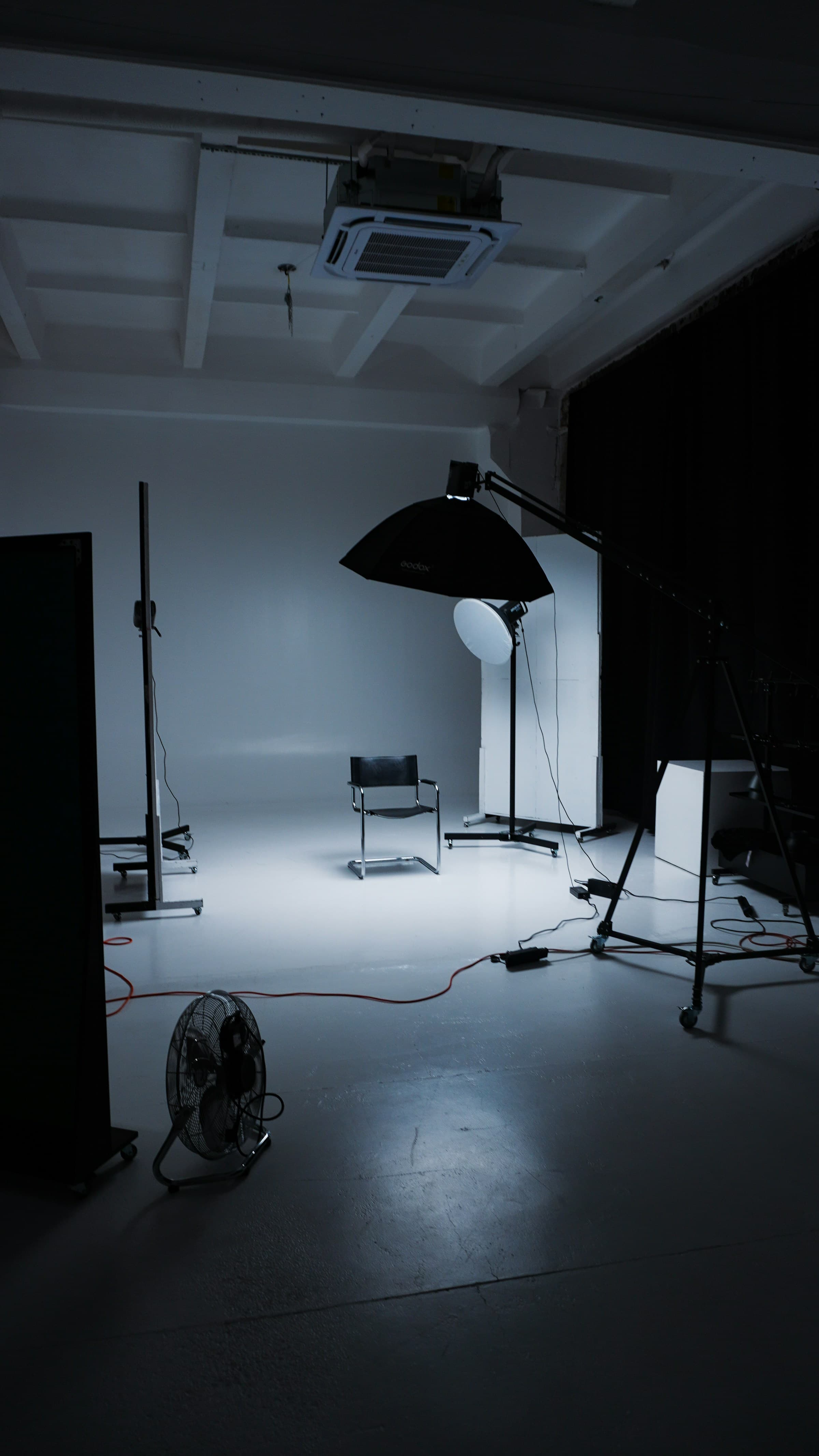 Cinematic creative studio with professional lighting equipment